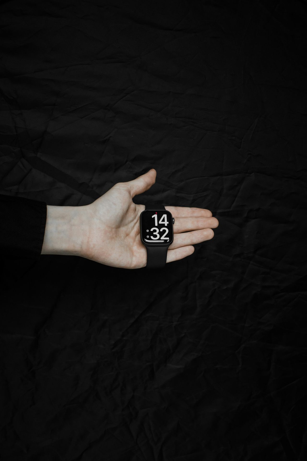 a person's hand with a wrist watch on it